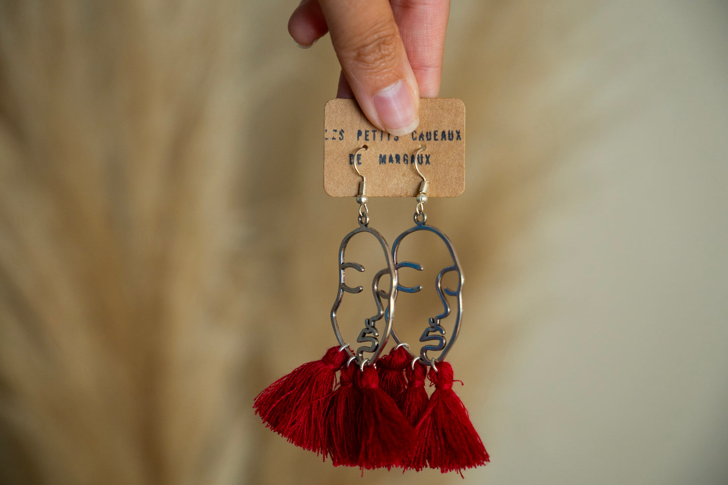 Boucles d'oreilles visage